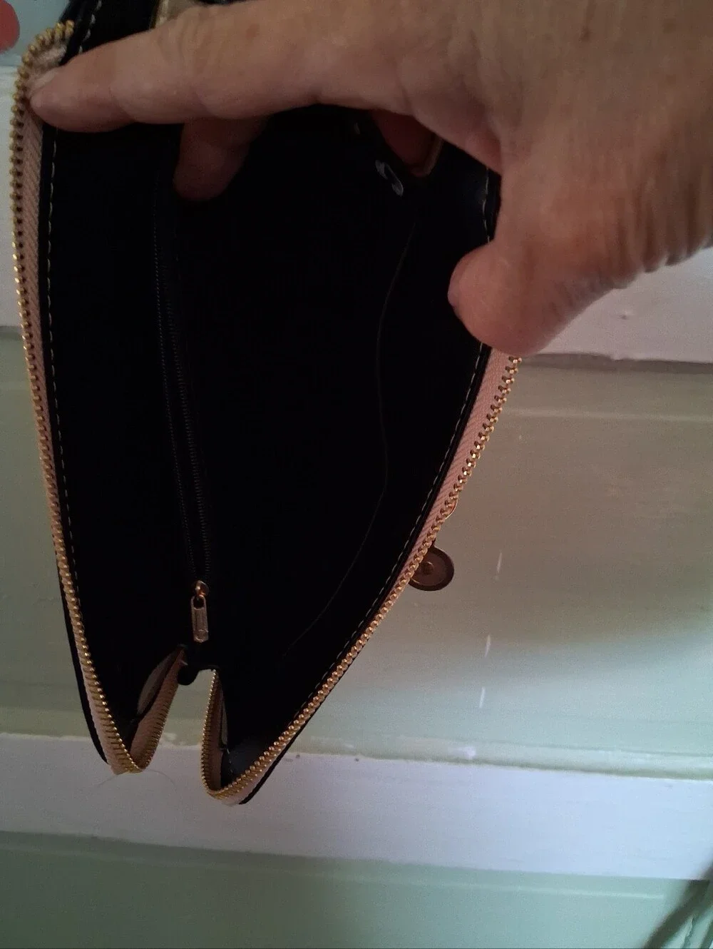 Fashionable Gold Crossbody Bag with Graphic Face Design